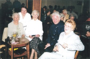 Father Heaney with parishioners at the church's 50th anniversary in 2001